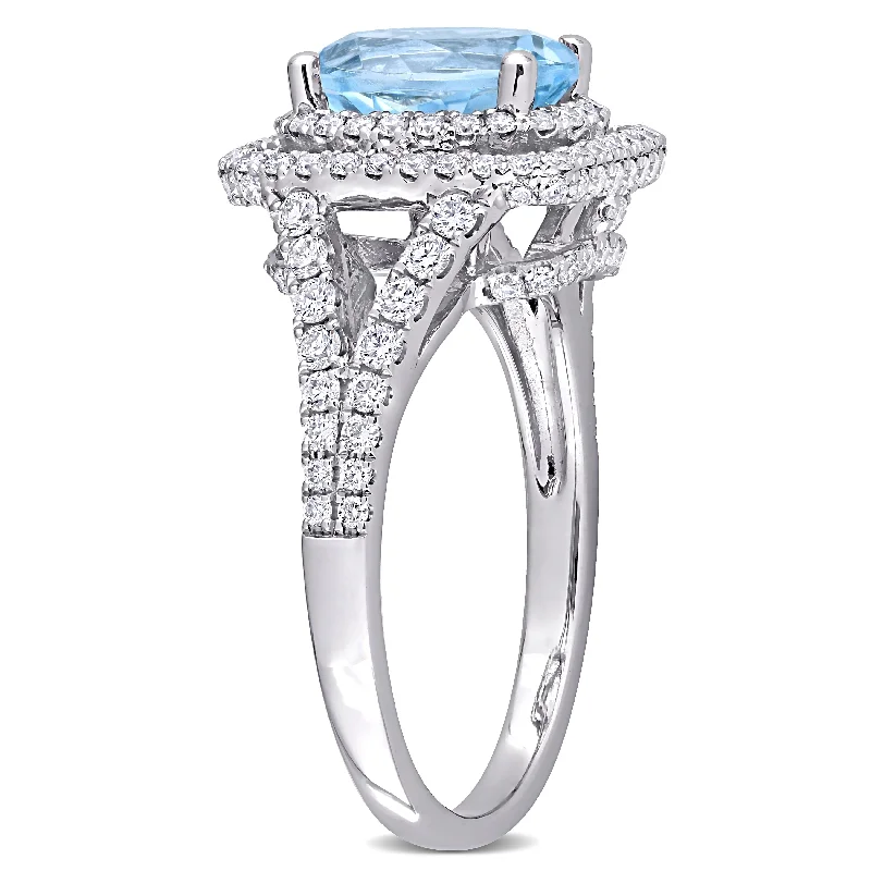 wedding rings with multiple stones -Miadora 14k White Gold Oval-cut Blue Topaz and 4/5ct TDW Diamond Halo Split Shank Cocktail Ring